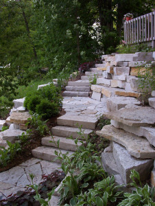 The lannon flagstone landings between the sets of stairs also work will with the natural lannon stone outcropping retaining walls.