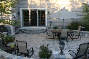 Late in the day on steamy summer afternoons, the River Birch casts a cool dappled shade over the patio space making the outdoor room usable even on the hottest of days. The Brussels Block ashlar paver pattern to the patio reinforces the casual but elegant nature of the space.